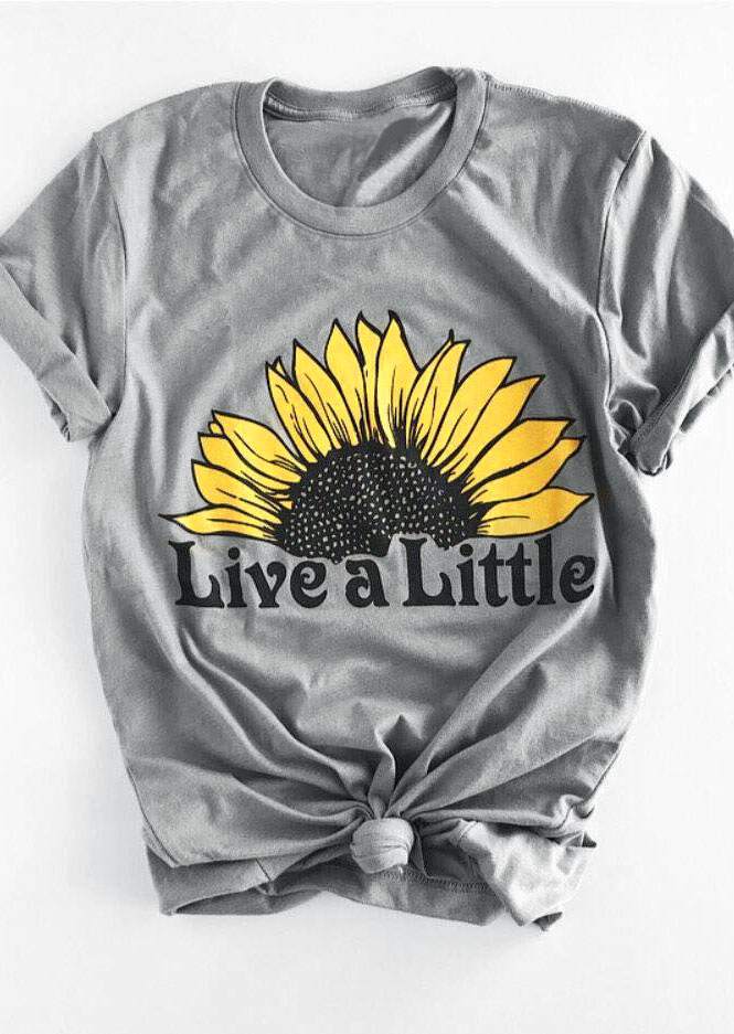 Grey t-shirt with sunflower graphic and "Live a Little" slogan
