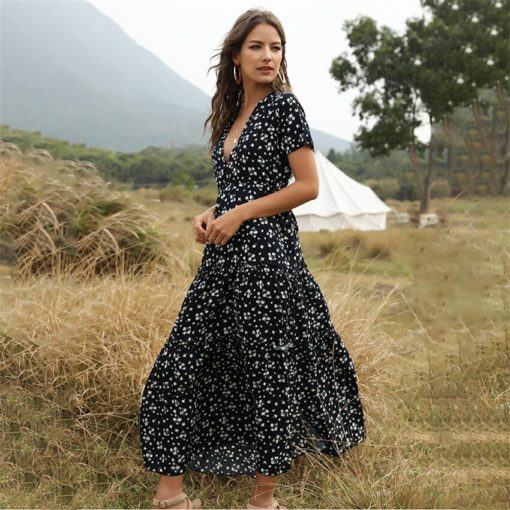 A lady in a field with bohemian clothing