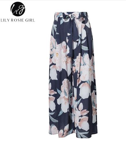 Lily Rosie Girl floral maxi skirt in blue with a matching belt, featuring a soft floral pattern.