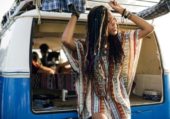 Adult Woman on Road Trip with Friends By Van